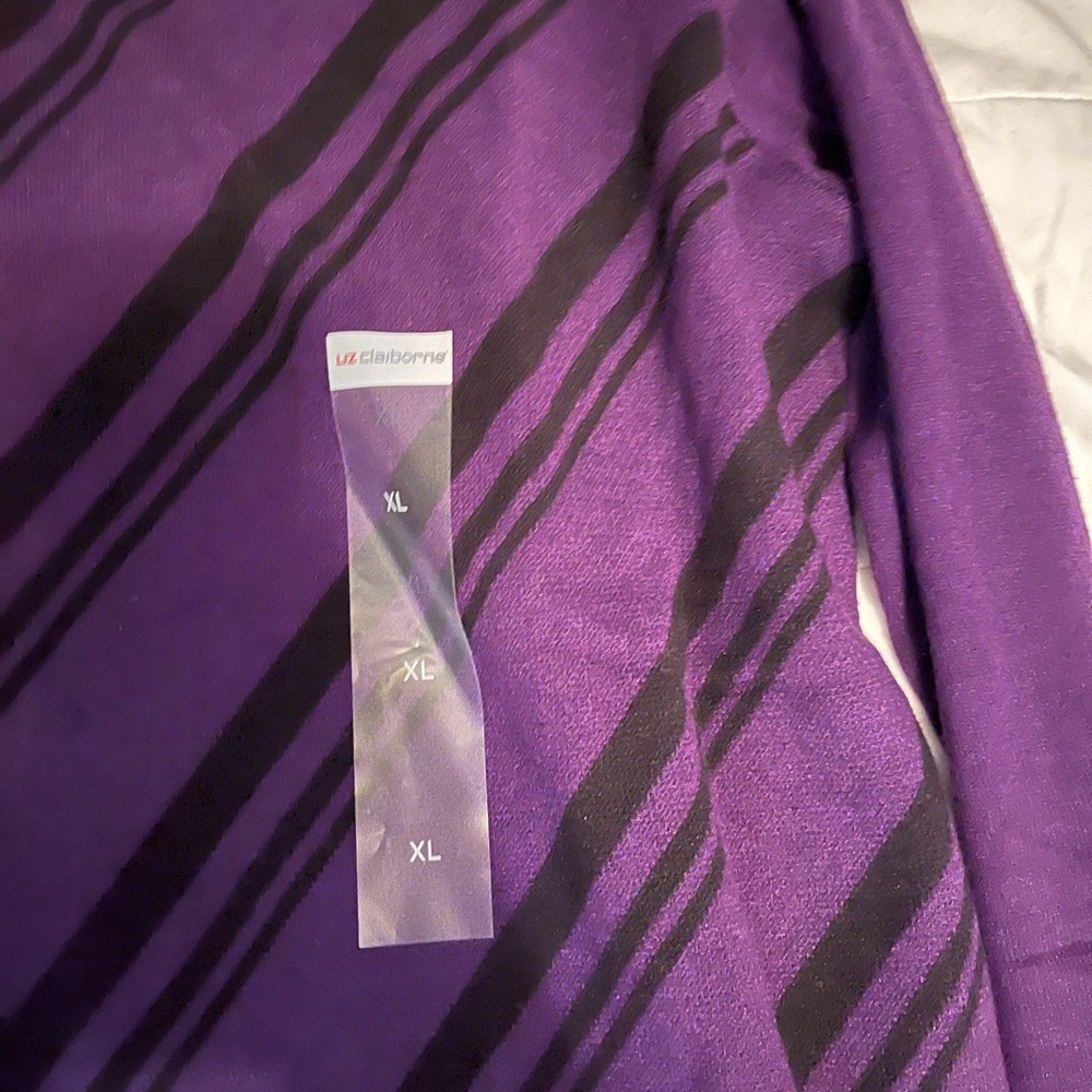 Purple & black color design on the front, but solid purple color on the back